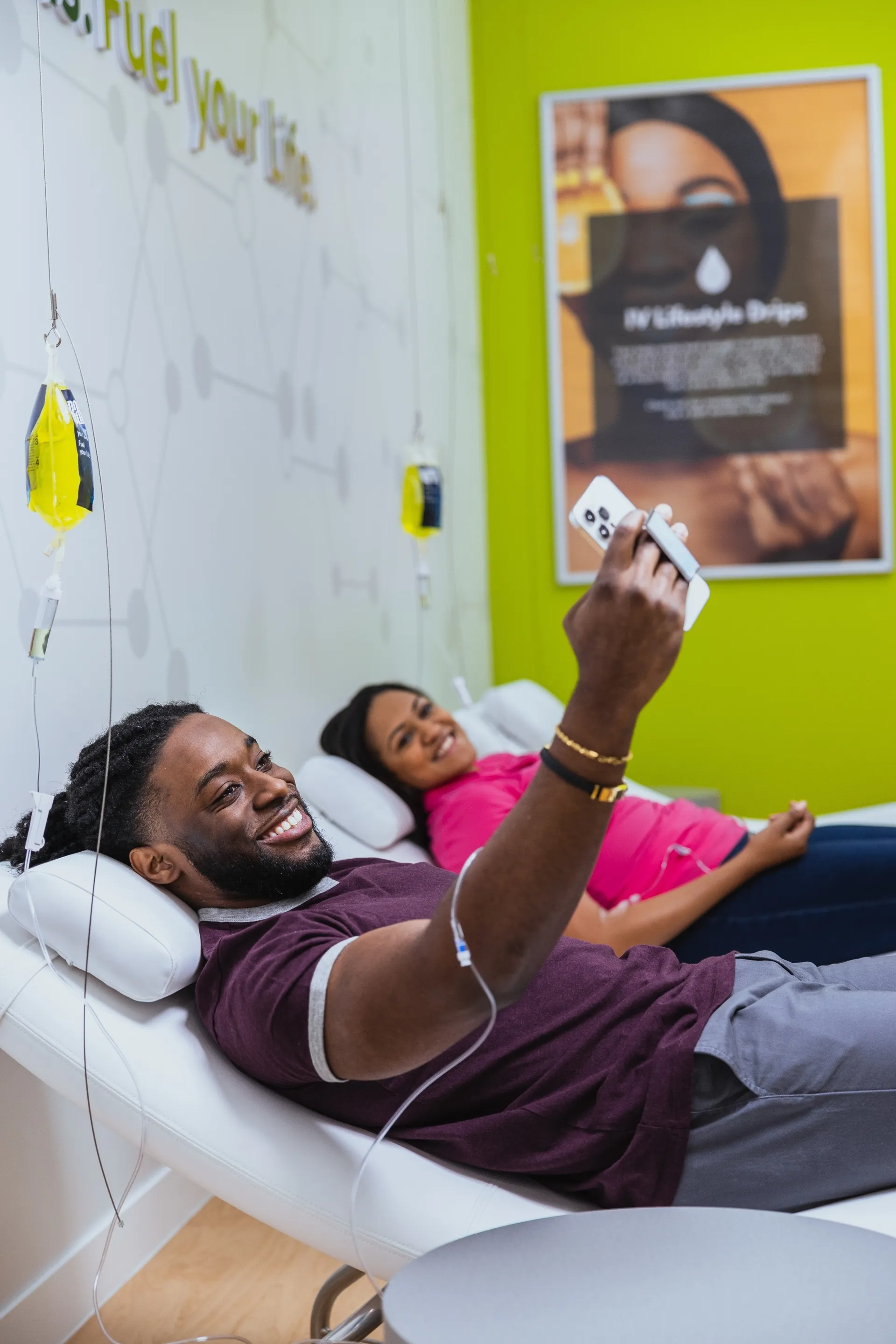 A client taking a selfie during her drip