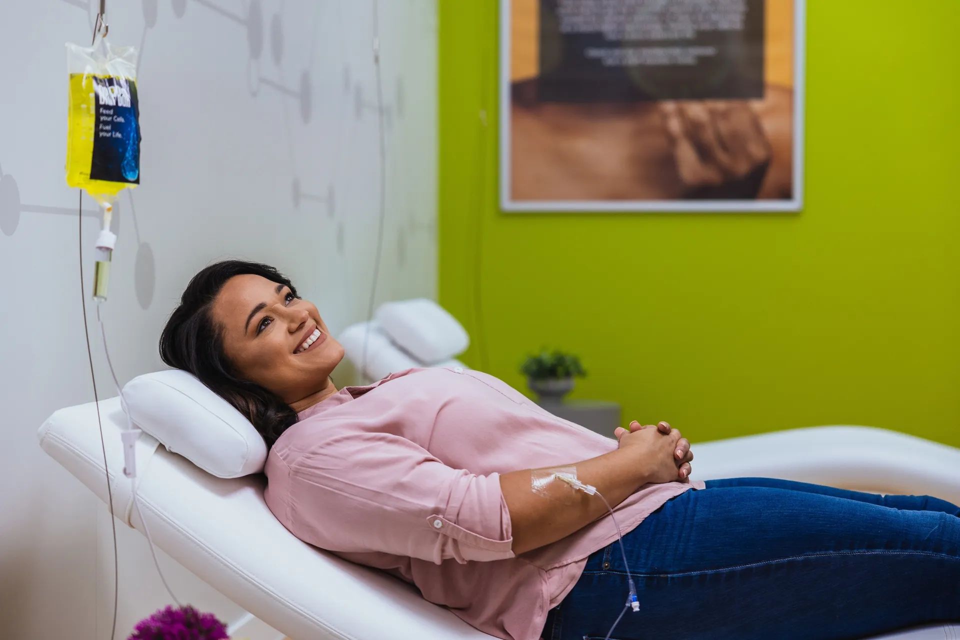 A client relaxing in a white recliner