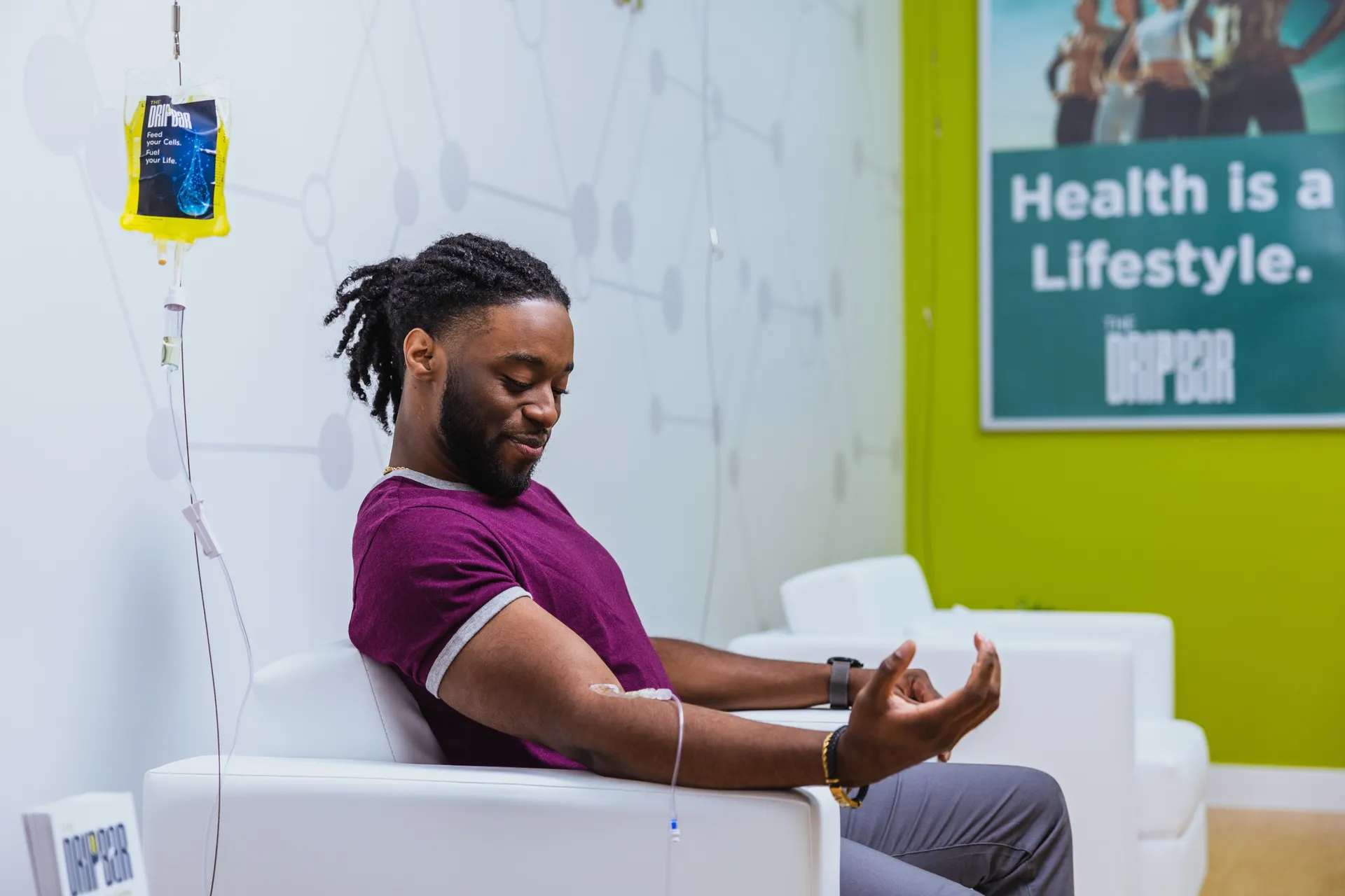 A client smiling from his recliner
