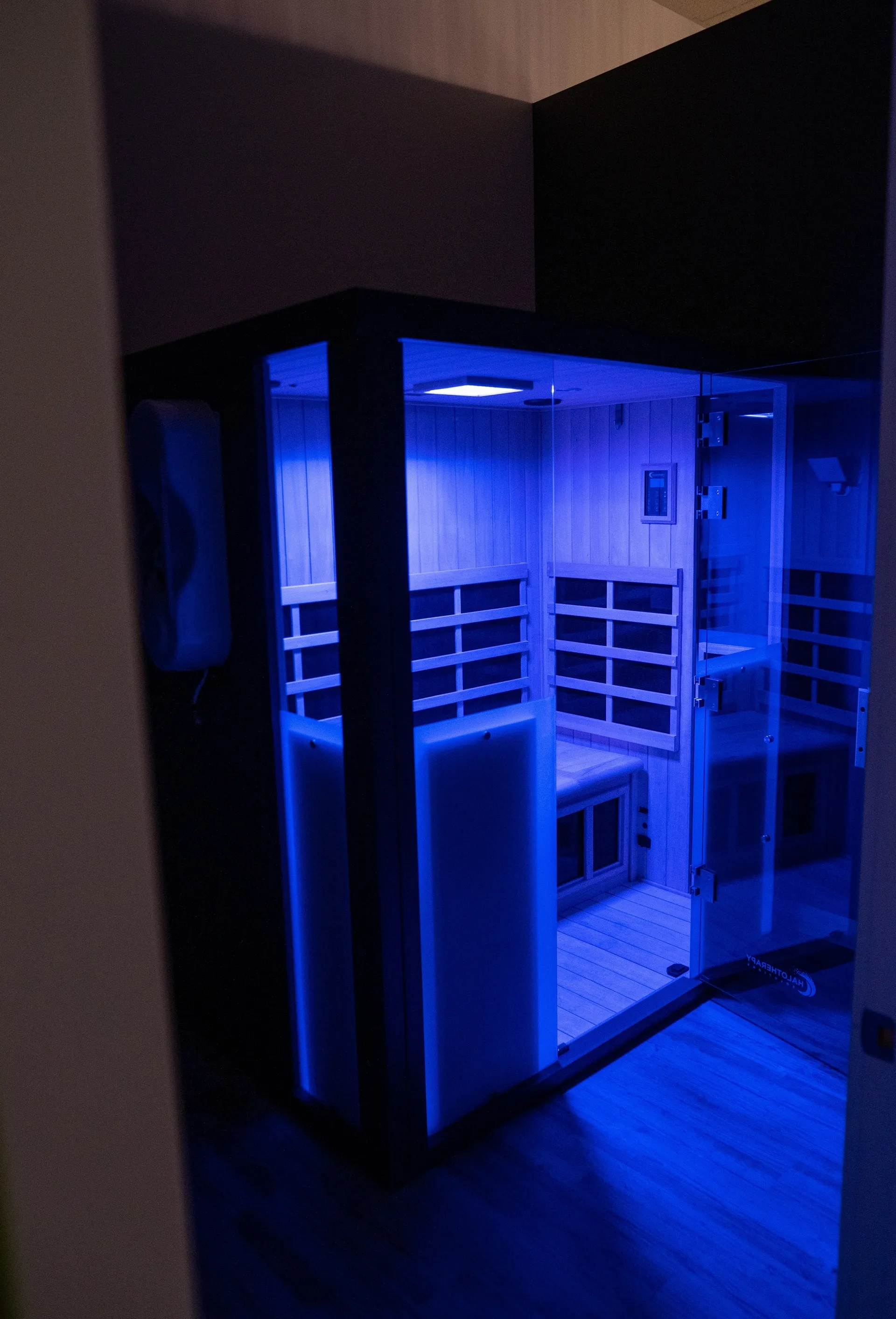 The infrared sauna glowing blue