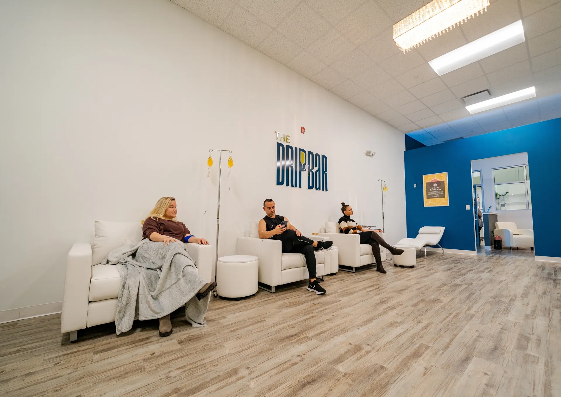 The DRIPBaR lounge with its blue accent wall